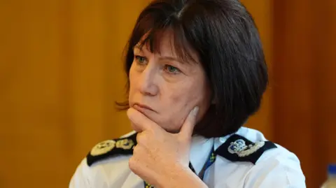 PA Media Jo Farrell, the chief constable of Police Scotland, looking concerned and thoughtful with her hand on her chin 