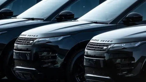 New Black Range Rover cars pictured parked next to each other