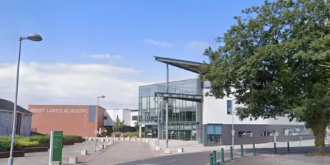 Google West Lakes Academy in Egremont. The school is made of two blocks - a glass fronted one and a red-brick one.